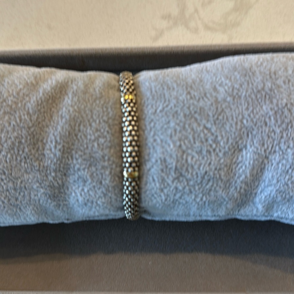 LAGOS sterling silver with 18-karat yellow gold stations. Caviar beaded rope.